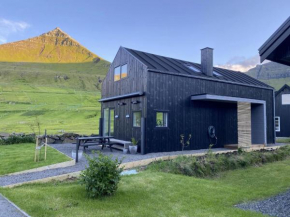 Luxury Cottage with Stunning Views - Okkara summarhús við Gjógv